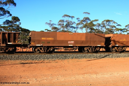 100731 03171
WOE type iron ore waggon WOE 31100 is one of a batch of one hundred and thirty built by Goninan WA between March and August 2001 with serial number 950092-090 and fleet number 685 for Koolyanobbing iron ore operations of 83 tonne load capacity built for Portman Mining with a revised load of 82.5 tonnes and PORTMAN has been painted out, empty train arriving at Binduli Triangle, July 31, 2010.
Keywords: WOE-type;WOE31100;Goninan-WA;950092-090;