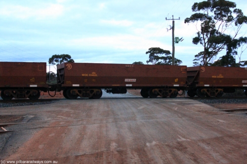 100822 6250
WOE type iron ore waggon WOE 33462 is one of a batch of one hundred and twenty eight built by United Group Rail WA between August 2008 and March 2009 with serial number 950211-004 and fleet number 8967 for Koolyanobbing iron ore operations, on empty train 1416 at Hampton, August 22, 2010.
Keywords: WOE-type;WOE33462;United-Group-Rail-WA;950211-004;