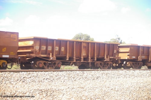 PD 12607
Binduli, WO type iron ore waggon WO 31209 is leader of a batch of sixty two built by Goninan WA between April and August 2000 with serial number 950086-001 and fleet number 105 for Koolyanobbing iron ore operations, and is a Goninan built replacement WO type waggon with a build date of 05/2000, this replaces the original WAGR built WO type waggon with a WOD type with square features opposed to the curved ones as on the original WO. Also note the angled lip extension to the top of the body.
Keywords: Peter-D-Image;WO-type;WO31209;Goninan-WA;950086-001;