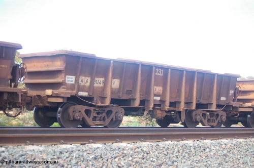 PD 12612
Binduli, WO type iron ore waggon WO 31240 is one of a batch of eighty six built by WAGR Midland Workshops between 1967 and March 1968 with fleet number 131 for Koolyanobbing iron ore operations, with a 75 ton and 1018 ft³ capacity, this unit was converted to WOC for coal in 1986 till 1994 when it was re-classed back to WO. Seen here with the body top lip also fitted.
Keywords: Peter-D-Image;WO-type;WO31240;WAGR-Midland-WS;