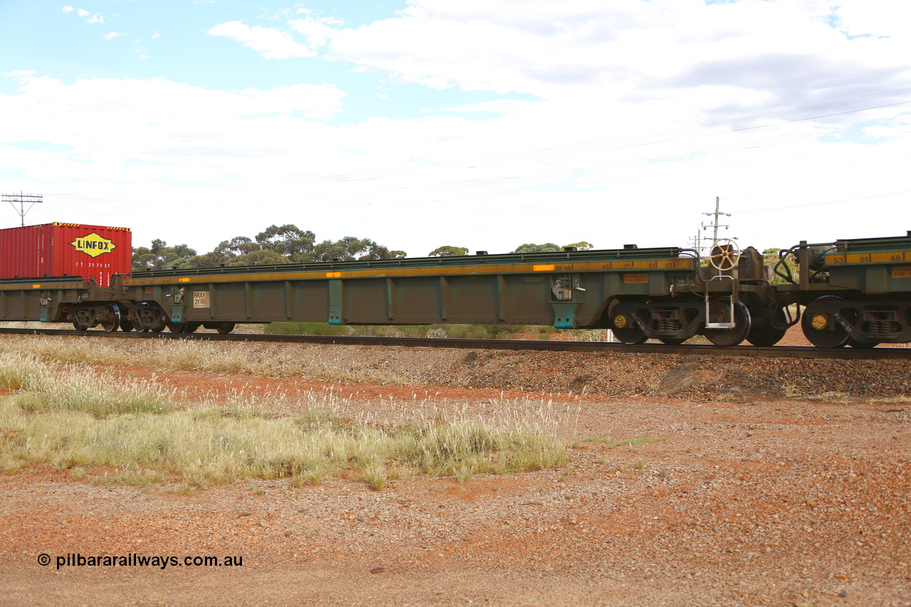 210407 9851
Parkeston, 2MP5 intermodal train, RRXY 2, platform 2 empty. The RRXY type 5-pack well waggon set is one of eleven built by Bradken Qld in 2002 for Toll from a Williams-Worley design.
Keywords: RRXY-type;RRXY2;Williams-Worley;Bradken-Rail-Qld;