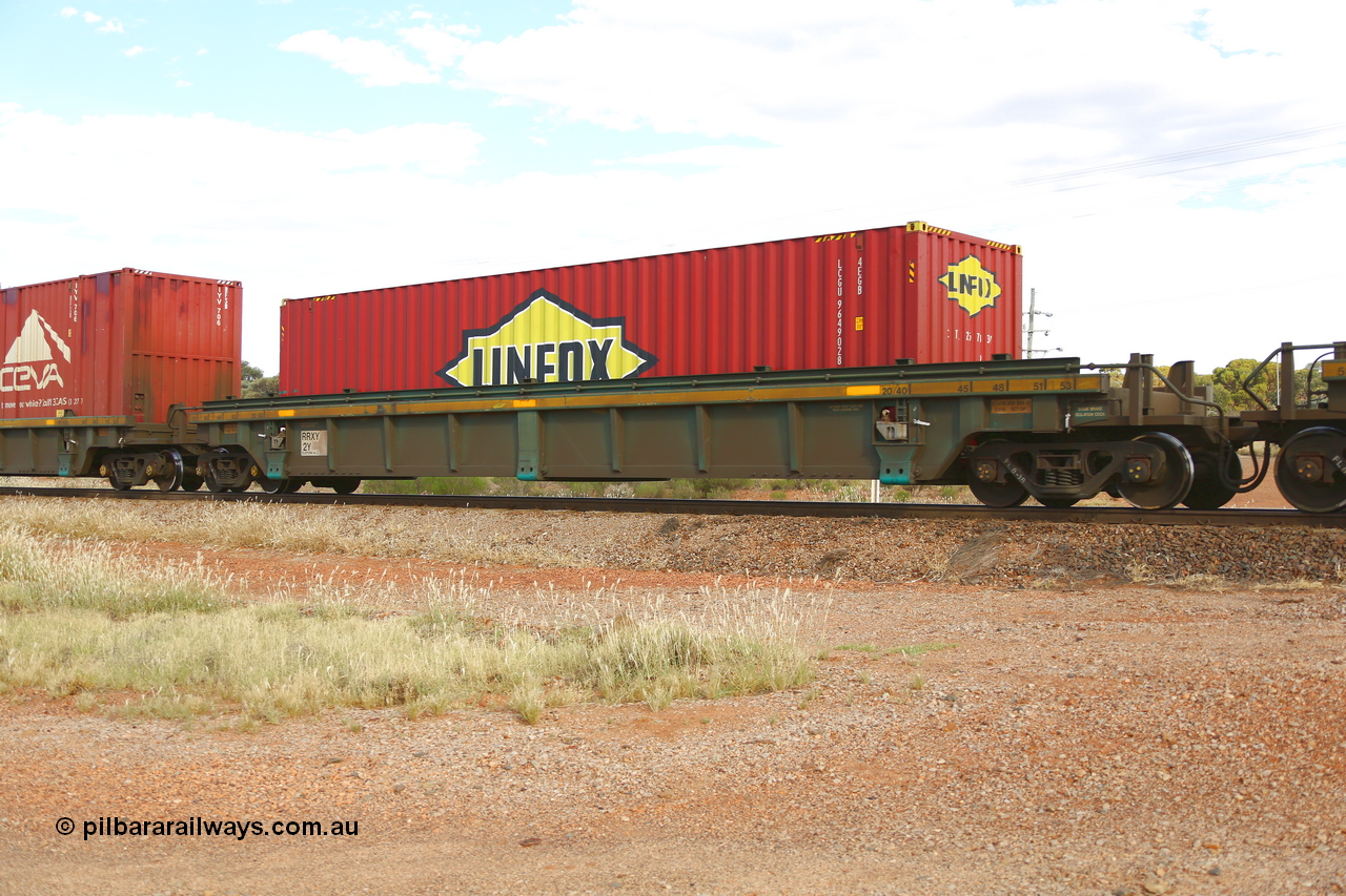 210407 9852
Parkeston, 2MP5 intermodal train, RRXY 2, platform 3 with a Linfox 4EGB type 40' container LCGU 964902. The RRXY type 5-pack well waggon set is one of eleven built by Bradken Qld in 2002 for Toll from a Worley-Williams design.
Keywords: RRXY-type;RRXY2;Worley-Williams;Bradken-Rail-Qld;