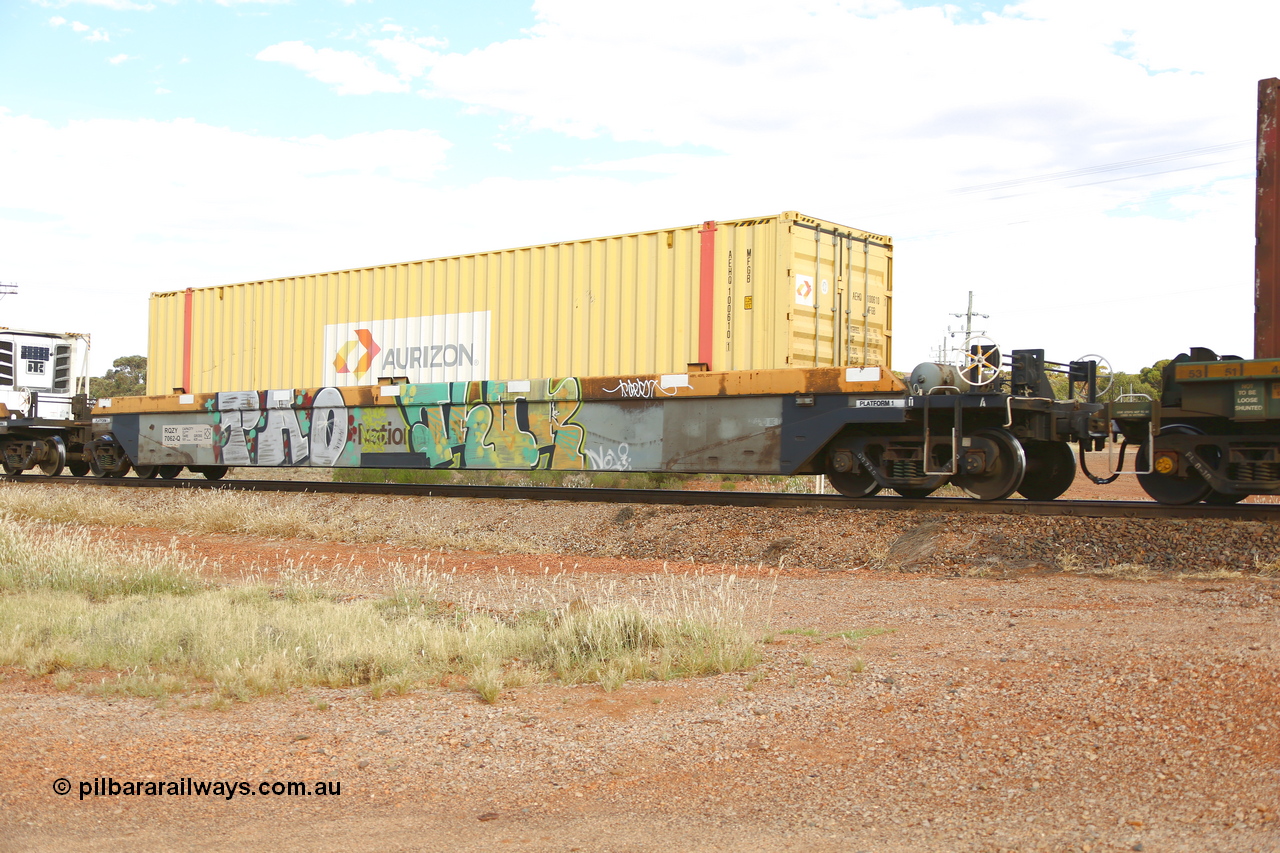 210407 9855
Parkeston, 2MP5 intermodal train, RQZY 7062, platform 1 with an Aurizon 48' MFGB type container AEHQ 100610. The RQZY type is a five unit bar coupled well container waggon built as one of a batch of thirty two by Goninan NSW for National Rail in 1995/96.
Keywords: RQZY-type;RQZY7062;Goninan-NSW;