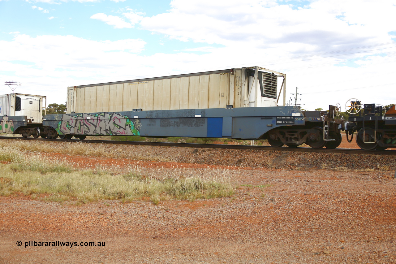 210407 9860
Parkeston, 2MP5 intermodal train, CQWY type well waggon 5047 well 2 with a 46' RFRG type reefer ARLS 432. The CQWY well waggon pairs were built by Bluebird Rail Operations SA in a batch of sixty pairs in 2008 for CFCLA.
Keywords: CQWY-type;CQWY5047;CFCLA;Bluebird-Rail-Operations-SA;