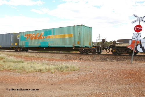 210407 9878
Parkeston, 2MP5 intermodal train, platform 1 of 5-pack low profile skel waggon set RRYY 13, one of fifty two such waggon sets built by Bradken at Braemar NSW in 2004-05, with a Toll MEG1 type 48' container TCML 48482.
Keywords: RRYY-type;RRYY13;Williams-Worley;Bradken-NSW;