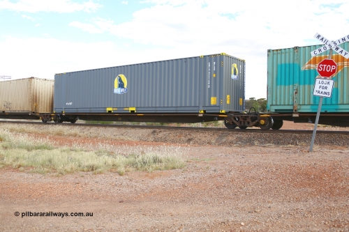 210407 9879
Parkeston, 2MP5 intermodal train, platform 2 of 5-pack low profile skel waggon set RRYY 13, one of fifty two such waggon sets built by Bradken at Braemar NSW in 2004-05, with a Royal Wolf MFGB type 48' container RWTU 922148.
Keywords: RRYY-type;RRYY13;Williams-Worley;Bradken-NSW;