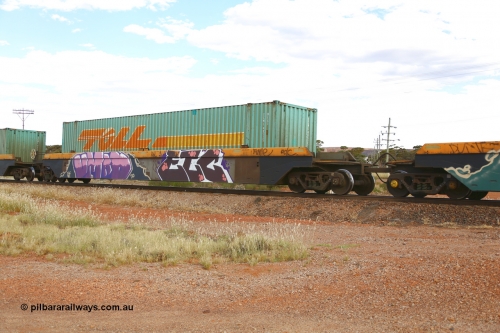 210407 9889
Parkeston, 2MP5 intermodal train, RRZY 7049 platform 2 of 5-pack well waggon set. Originally was an RQZY type, a five unit bar coupled well container waggon built as one of a batch of thirty two by Goninan NSW for National Rail in 1995/96. Recoded to RRZY when repaired. Loaded with a Toll 48' MEG1 type container TCML 48525.
Keywords: RRZY-type;RRZY7049;Goninan-NSW;RQZY-type;