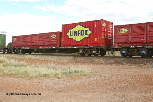 210407 9899
Parkeston, 2MP5 intermodal train, RQSY type container waggon RQSY 34304 was originally built by Goninan NSW as an OCY type in a batch of one hundred in 1974/75. Recoded to NQOY, then NQSY, then to National Rail as RQSY in 1994. Loaded with a Linfox 20' container FSWB 963488 and a 40' Linfox half height side door container LSDU 6940106.
Keywords: RQSY-type;RQSY34304;Goninan-NSW;OCY-type;NQOY-type;