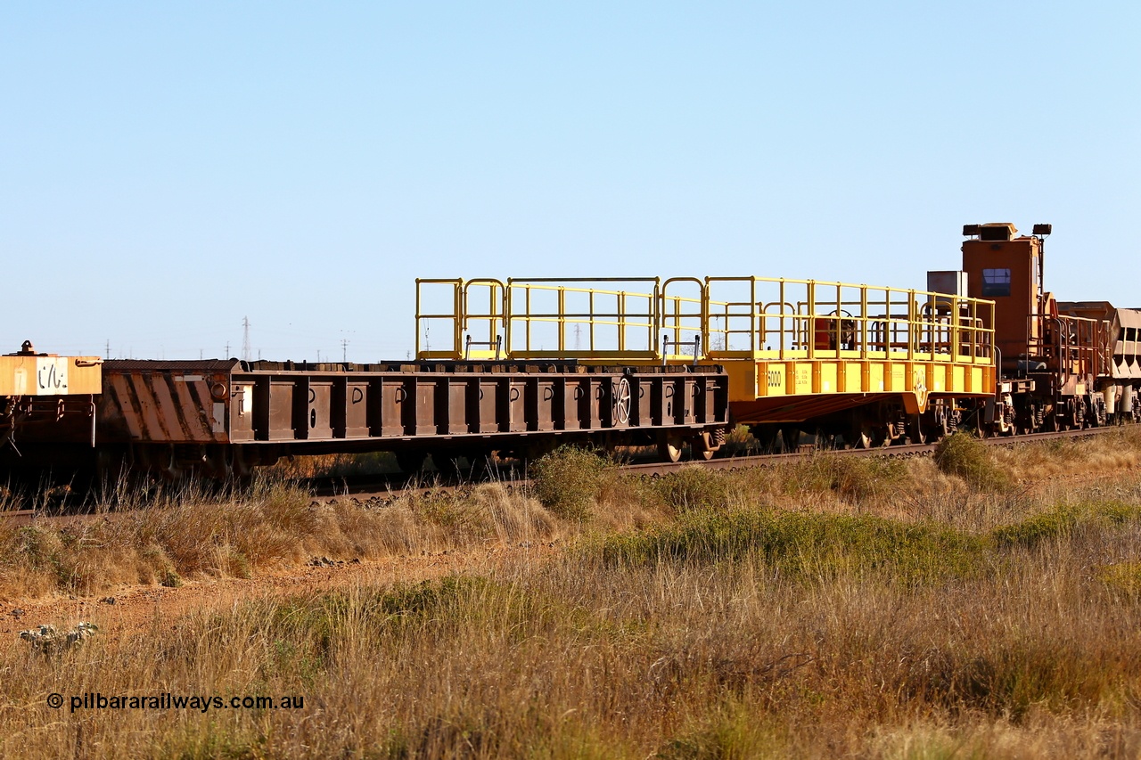 180527 1208
Pippingarra, near the 17 km on the former Goldsworthy line, BHP stored redundant service waggons, the two heavy weight waggons, the original Vickers Hoskins built 6004 137.1 tonne capacity Ortner Freight Car Company design, and the much newer Gemco WA built 100 tonnes capacity waggon. 27th May 2018. [url=https://goo.gl/maps/duWQ1f8kqf92]GeoData[/url].
