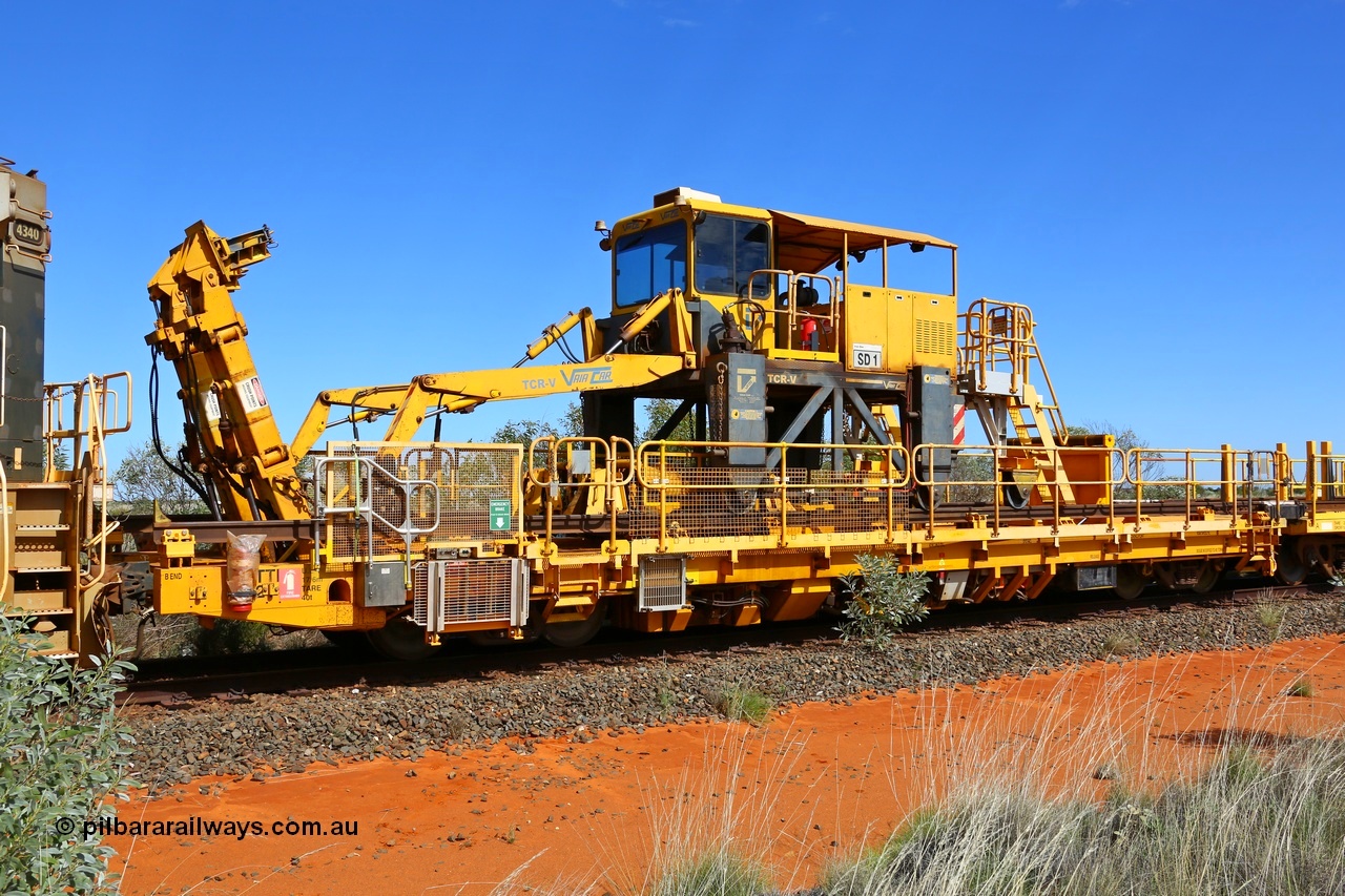 180614 1342
Goldsworthy Junction, Lead-Off Lead-On waggon STTR class STTR 6214 on the end of the Steel Train or rail recovery and transport train, built by Gemco Rail WA, the chutes can be seen standing up with the squeeze rollers, the straddle crane SD 1 is a new unit built by Vaia Car model no. TCR-V. [url=https://goo.gl/maps/uYkrn38PhF92]GeoData[/url]. 14th June 2018.
