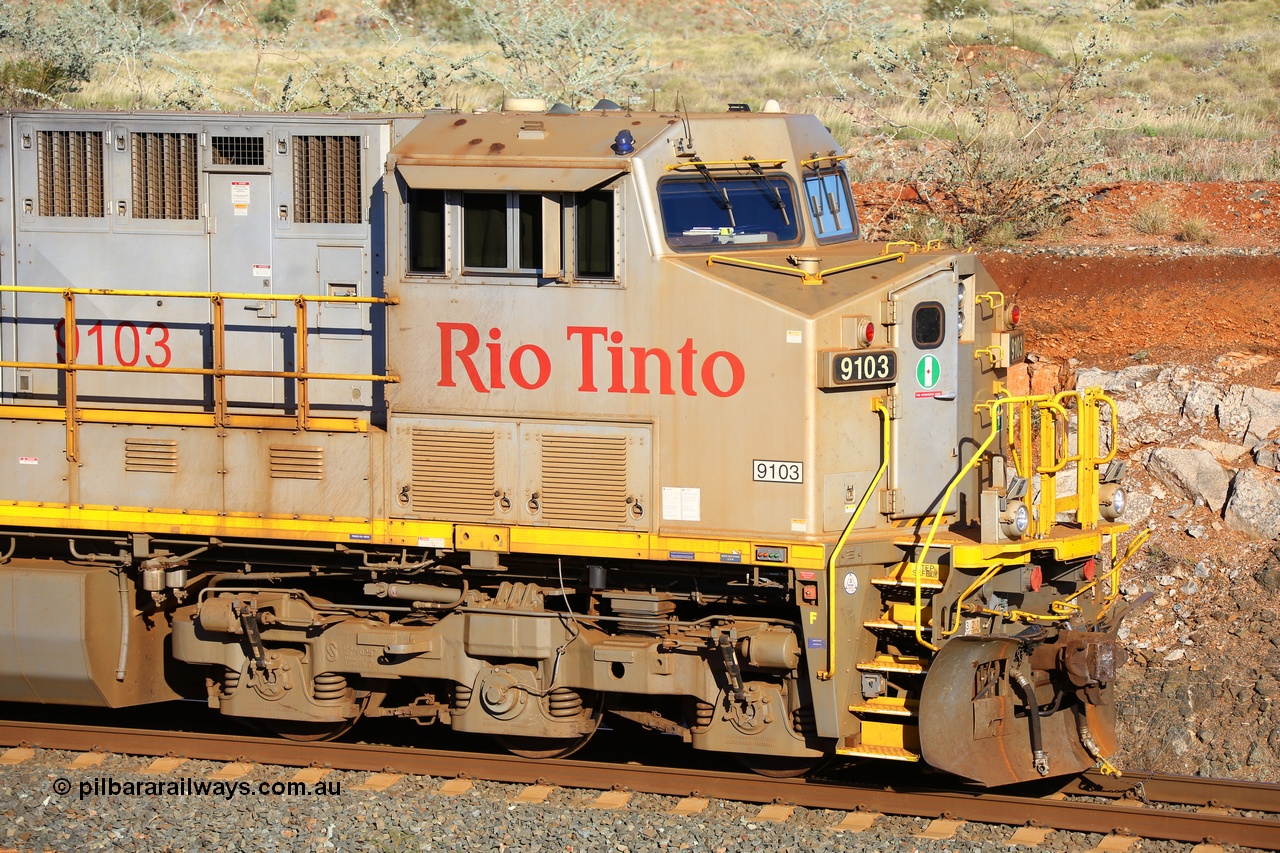 180616 1657
Cooya Pooya, 32 km on the Cape Lambert line, Rio Tinto loco 9103 with serial 61941 a GE Erie built GE model ES44ACi from the 1st order in Rio Tinto Stripes livery is 'tied down' to the mainline following a total loss of air, the locomotive's hose bag can be seen chained to the rail in case of movement. The train pulled a coupling around the 45 car position. 16th June 2018. [url=https://goo.gl/maps/ckyFypg4LAy]Geodata[/url]
Keywords: 9103;61941;GE;ES44ACi;Rio-Tinto-Stripes;