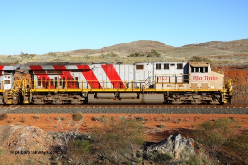 180616 1659
Cooya Pooya, 32 km on the Cape Lambert line, Rio Tinto loco 9103 with serial 61941 a GE Erie built GE model ES44ACi from the 1st order in Rio Tinto Stripes livery side view, following a total loss of air, the locomotive's hose bag is chained to the rail in case of movement. The train pulled a coupling around the 45 car position. 16th June 2018. [url=https://goo.gl/maps/ckyFypg4LAy]Geodata[/url]
Keywords: 9103;GE;ES44ACi;61941;Rio-Tinto-Stripes;