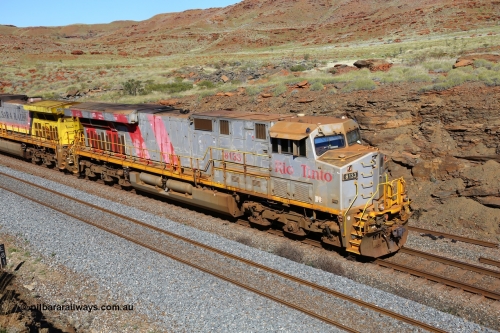 180616 1757
At the 81 km on the Tom Price West mainline, Rio Tinto loco 8133 with serial 59136 a GE Erie built GE model ES44DCi from the 2nd order in Rio Tinto Stripes livery, heavily faded from acid washing, is from the third order of these units built in June 2008 at GE's Erie plant. 16th June, 2018.
Keywords: 8133;GE;ES44DCi;59136;Rio-Tinto-Stripes;