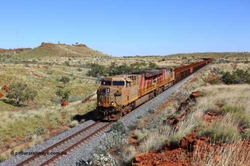180616 1846
Maitland Siding, a loaded Mesa A train runs along the mainline behind the standard double General Electric ES44ACi units that operate the Robe Valley trains, Rio Tinto loco 9113 with serial 62544 a GE Erie built GE model ES44ACi from the 2nd order in Rio Tinto Stripes livery leads sister unit 9114 serial 62545 at the 96 km. 19th June 2018. [url=https://goo.gl/maps/7sNyPJJ9ZdQ2]GeoData[/url].
Keywords: 9113;GE;ES44ACi;62544;Rio-Tinto-Stripes;
