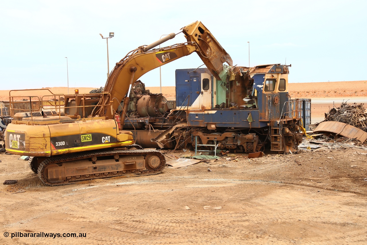 160128 00610
Wedgefield, Sims Metal Yard, Goninan rebuilt GE model CM40-8M unit 5661 is now match for the 40 tonne Cat excavator model 330DL as the shears tear the cab to pieces.
Keywords: 5661;Goninan;GE;CM40-8M;8412-06/94-152;rebuild;Comeng-NSW;ALCo;M636C;5488;C6084-4;