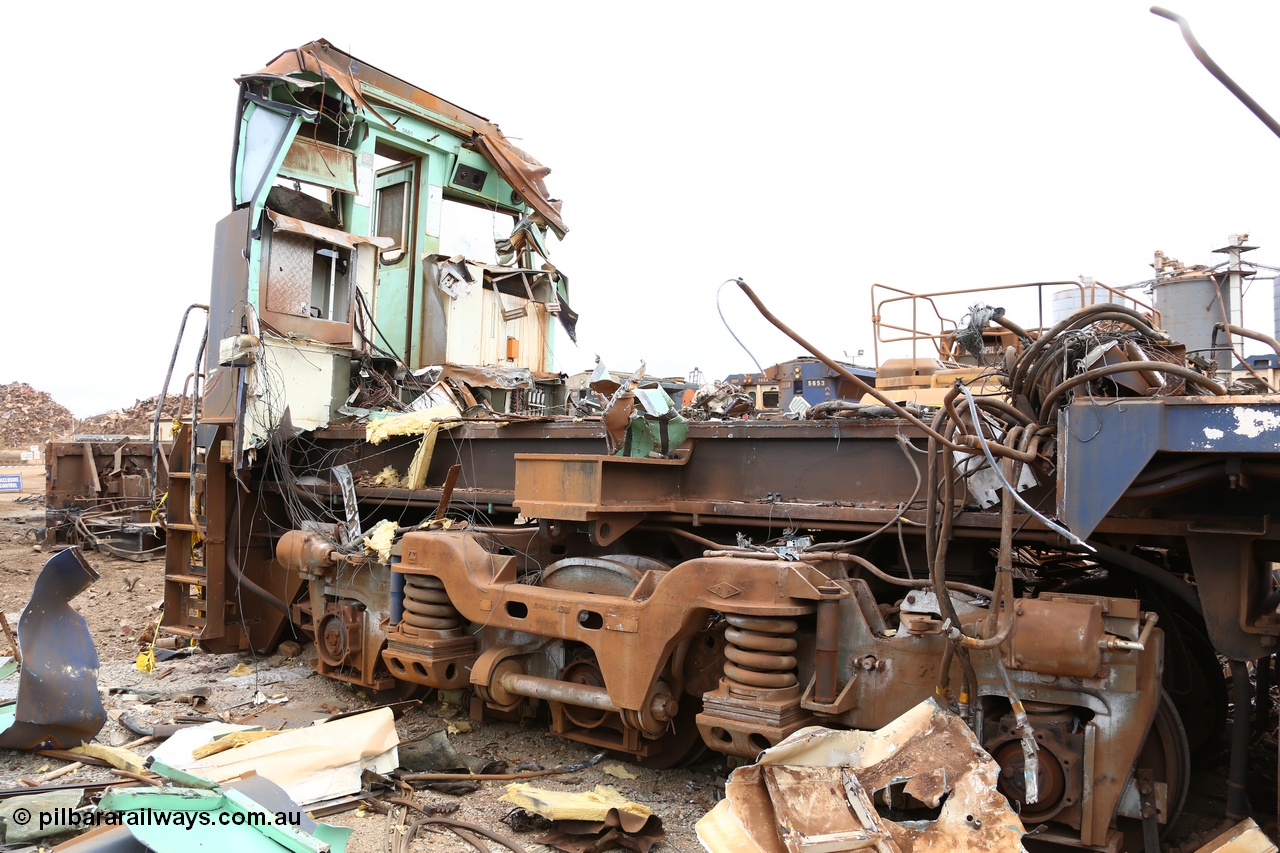 160128 00882
Wedgefield, Sims Metal Yard, view looking at the inside of the cab front wall and the ALCo Hi-Ad bogie shows the external coil secondary suspension.
Keywords: 5661;Goninan;GE;CM40-8M;8412-06/94-152;rebuild;Comeng-NSW;ALCo;M636C;5488;C6084-4;