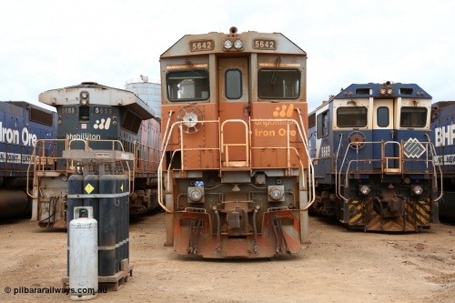 160128 00383
Wedgefield, Sims Metal yard, lined up waiting biding their time, three years separate these Goninan rebuilds CM40-8M unit 5642 serial 8281-07/92-131 and final unit 5669 CM40-8MEFI model serial 8412-02/95-160. The only differences visible are the pressed metal handbrake wheel and cast one, snow plough of 42 and the marker lights on 69.
Keywords: 5642;Goninan;GE;CM40-8M;8281-07/92-131;rebuild;AE-Goodwin;ALCo;C636;5467;G6041-3;