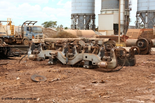160128 00386
Wedgefield, Sims Metal yard, upturned bogie from recently scrapped new built Goninan CM39-8 unit 5632. Bogie is of a GE floating bolster design, serial 1-10-87.
Keywords: CM39-8;Goninan;GE;