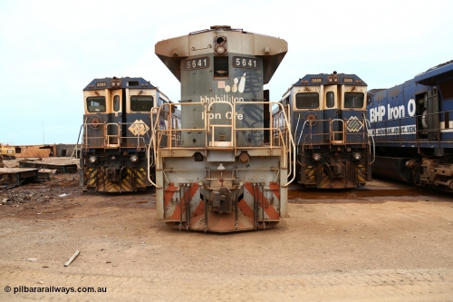 160128 00406
Wedgefield, Sims Metal Yard, rear view of Goninan rebuilt GE model CM40-8M 5641 serial 8281-06, builders no. 92-130 flanked either side by later rebuilds 5660 and 5668. Note the newer rebuilds have marker lights while 41 has none.
Keywords: 5641;Goninan;GE;CM40-8M;8281-06/92-130;rebuild;AE-Goodwin;ALCo;C636;5454;G6012-3;