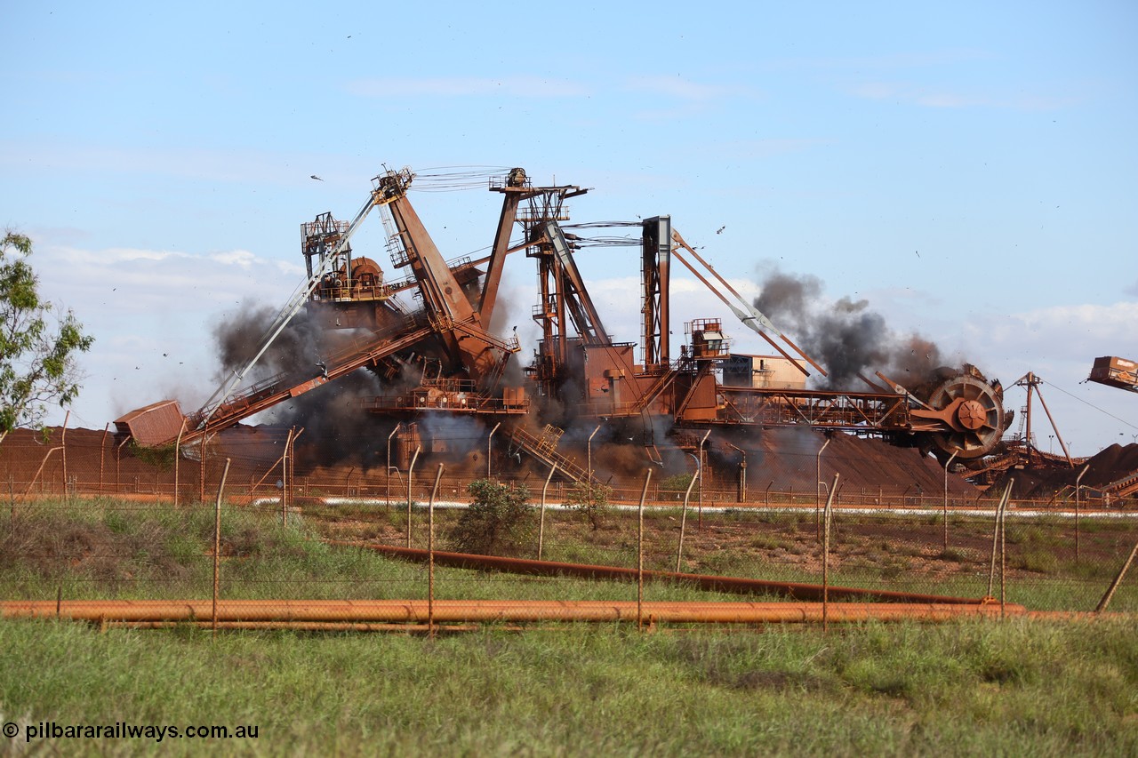 150518 8120
BHP Iron Ore old and retired ore stacker #4 and bucket wheel reclaimer #4 are blown apart to aid in the scrapping process.
