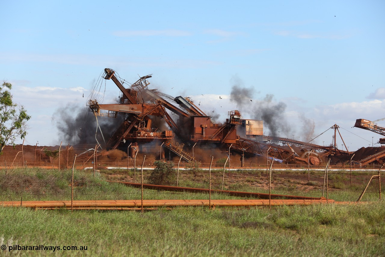 150518 8123
BHP Iron Ore old and retired ore stacker #4 and bucket wheel reclaimer #4 are blown apart to aid in the scrapping process.
