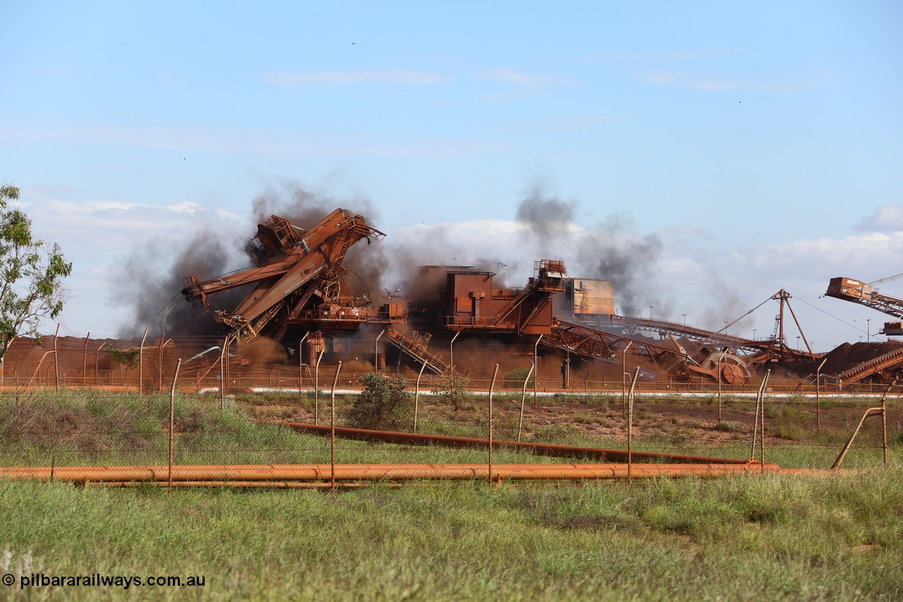 150518 8125
BHP Iron Ore old and retired ore stacker #4 and bucket wheel reclaimer #4 are blown apart to aid in the scrapping process.
