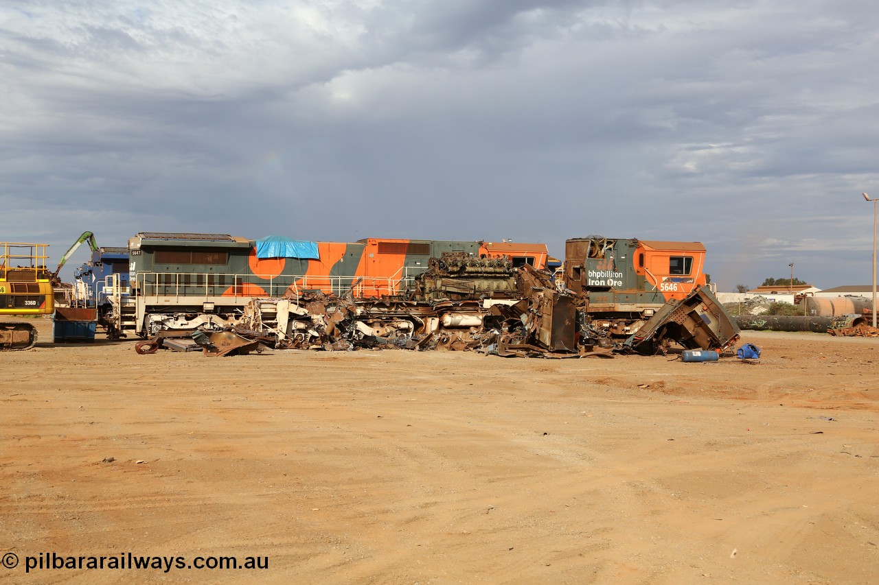 150522 8156
Wedgefield, Sims Metal yard, the first batch of BHP Billiton Dash 8 locos to be scrapped, 5646 serial 8244-11/92-135 one of a pair of new Goninan WA built CM40-8 units has already had most of the hood removed and the V16 7FDL prime mover is visible, sister unit 5647 sit along side with the same fate coming up next.
Keywords: 5646;Goninan;GE;CM40-8;8244-11/92-135;