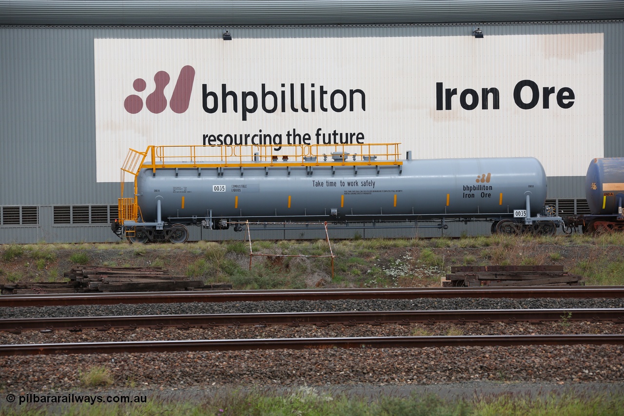 150523 8201
Nelson Point Yard, parked beside the Locomotive Service Shop, BHP Billiton diesel fuel tank waggon 0035 with safety slogan 'Take time to work safety', total capacity of 117 m3 for a nominal capacity of 113 m3 built in China by CNR - QRRS.
Keywords: CNR-QRRS-China;BHP-tank-waggon;