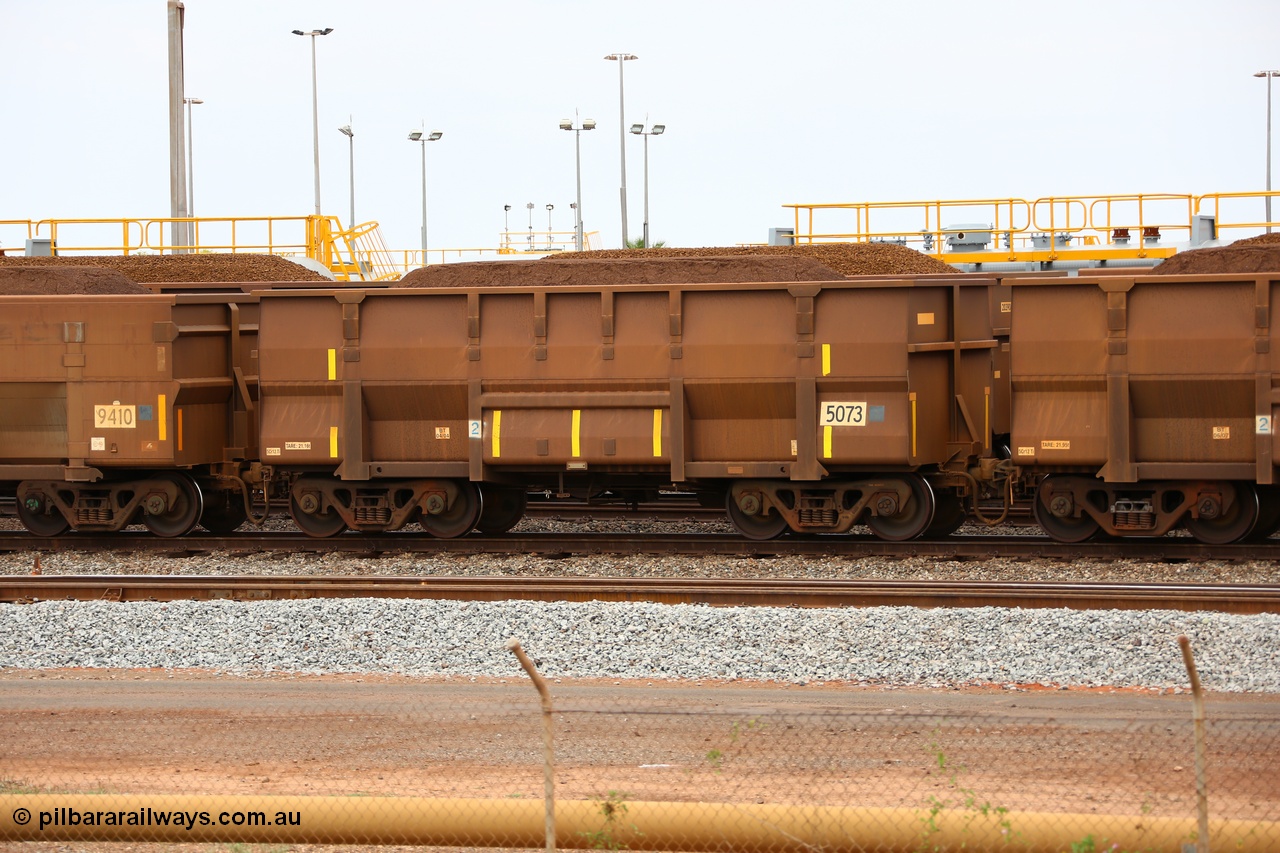 150523 8242
Nelson Point Yard, loaded ore waggon 5073, a Golynx style waggon built by Goninan, serial no. 950126-114 in 2004 with 5Cr12Ti stainless steel which does away with the need to paint the waggon interiors to prevent wear.
Keywords: Goninan-Golynx;BHP-ore-waggon;
