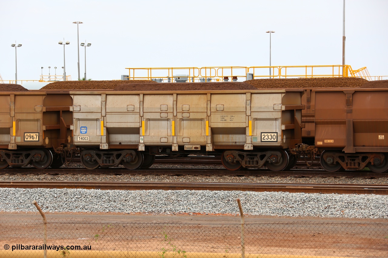 150523 8246
Nelson Point Yard, loaded ore waggon 2330, a CNR built QRRS style waggon built in 2014 out of T4003 stainless steel which does away with the need to paint the waggon interiors to prevent wear. The white circle around the corner from the number indicates the rotary coupler end, the number for this waggon also indicates it is a replacement for an original Comeng built waggon. Capacity 138.4 T, Tare 21.6 T and Volume 62 m3.
Keywords: CNR-QRRS-China;BHP-ore-waggon;