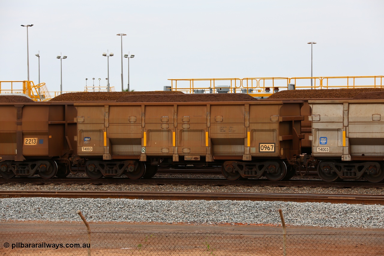 150523 8247
Nelson Point Yard, loaded ore waggon 0967, a CNR built QRRS style waggon built in 2012 out of T4003 stainless steel which does away with the need to paint the waggon interiors to prevent wear. The white circle around the corner from the number indicates the rotary coupler end, the number for this waggon also indicates it is filling a gap in the original waggon numbers. Capacity 138.4 T, Tare 21.6 T and Volume 62 m3.
Keywords: CNR-QRRS-China;BHP-ore-waggon;