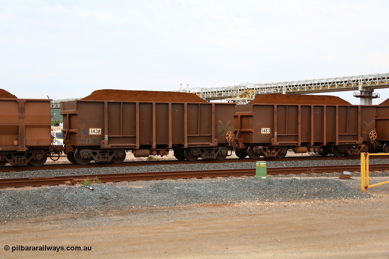 150523 8279
Finucane Island, a pair of Yandi Fines loaded Comeng built original style ore waggons, numbers 1438 and 1483 both date from a couple of orders from 1974. Both waggons have had the end sills filled in as a capacity improvement and both show signs of having been re-sheeted and repaired. 1483 is riding on light weight 38 tonne bogies. Geodata: [url=https://goo.gl/maps/HUaomivQnAw] -20.3363567 118.5497550 [/url].
Keywords: Comeng-WA;BHP-ore-waggon;