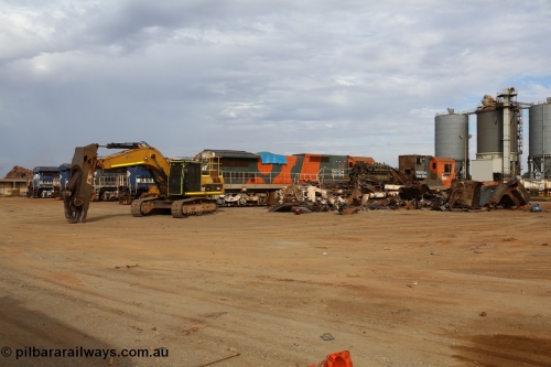150522 8153
Wedgefield, Sims Metal yard, the first batch of BHP Billiton Dash 8 locos to be scrapped, 5646 serial 8244-11/92-135 one of a pair of new Goninan WA built CM40-8 units has already had most of the hood removed and the V16 7FDL prime mover is visible, sister unit 5647 sit along side with the same fate coming up next.
Keywords: 5646;Goninan;GE;CM40-8;8244-11/92-135;