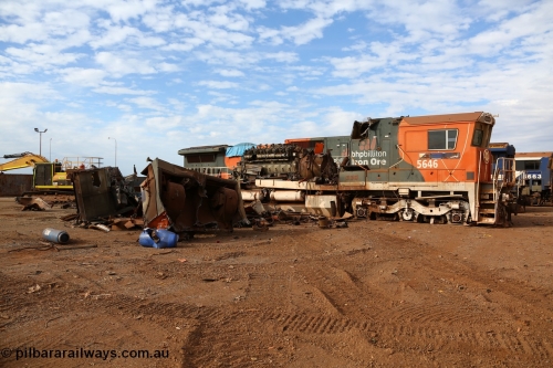 150522 8160
Wedgefield, Sims Metal yard, the first batch of BHP Billiton Dash 8 locos to be scrapped, 5646 serial 8244-11/92-135 one of a pair of new Goninan WA built CM40-8 units has already had most of the hood removed and the V16 7FDL prime mover is visible.
Keywords: 5646;Goninan;GE;CM40-8;8244-11/92-135;
