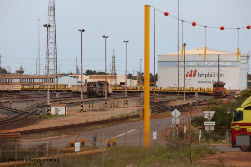 150523 8231
Nelson Point Yard, view across BI-LO Crossing, a throw back to days that the supermarket was in fact a BI-LO, well before the current Woolworths, and Action before that. Dash 8 units in the yard, on the 5642 with the Steel Train and 5648 with another on a rake of index waggons. The 2 km post can just be made out at the third light pole from the right.
