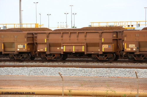 150523 8244
Nelson Point Yard, loaded ore waggon 6531, a Golynx style waggon built by Goninan in 2007 with asset number of 2038898 out of 5Cr12Ti stainless steel which does away with the need to paint the waggon interiors to prevent wear.
Keywords: Goninan-WA;Golynx;BHP-ore-waggon;