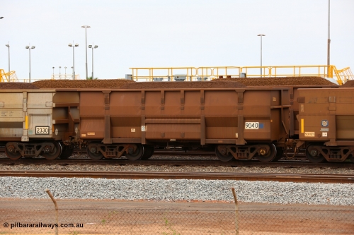 150523 8245
Nelson Point Yard, loaded ore waggon 9040, a Golynx style waggon built by Goninan in 2005 with asset number of 203485 out of 5Cr12Ti stainless steel which does away with the need to paint the waggon interiors to prevent wear.
Keywords: Goninan-WA;Golynx;BHP-ore-waggon;