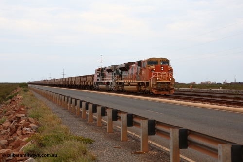 150523 8265
Finucane Island, empty train heading back to Boodarie behind Progress Rail EMD SD70ACe unit 4379 serial 20108424-006 and a newly arrived and named sibling 4474 'Raymond White' serial 20148001-007. Geodata: [url=https://goo.gl/maps/3oDrc9JAS762] -20.3341700 118.5504083 [/url].
Keywords: 4379;Progress-Rail-Muncie-USA;EMD;SD70ACe;20108424-006;