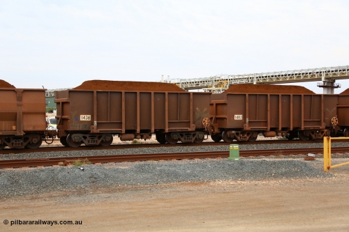 150523 8279
Finucane Island, a pair of Yandi Fines loaded Comeng built original style ore waggons, numbers 1438 and 1483 both date from a couple of orders from 1974. Both waggons have had the end sills filled in as a capacity improvement and both show signs of having been re-sheeted and repaired. 1483 is riding on light weight 38 tonne bogies. Geodata: [url=https://goo.gl/maps/HUaomivQnAw] -20.3363567 118.5497550 [/url].
Keywords: Comeng-WA;BHP-ore-waggon;