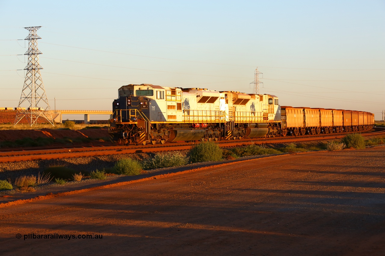 170726 9461
Boodarie, a loaded FMG iron ore train round the large curve at the 5 km as the train is passing under the Great Northern Highway behind Progress Rail Muncie USA built SD70ACe/LCi unit 717 serial 20118693-009 and sister 718 as they head for the car dumper unloading balloon loops. 26th July 2017.
Keywords: FMG-717;Progress-Rail-Muncie-USA;EMD;SD70ACe/LCi;20118693-009;