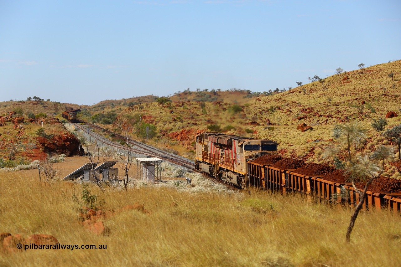 170729 0289
Maitland Siding on the former Robe River line a loaded Deepdale train heading for Cape Lambert behind the standard Rio Tinto motive power for this line, double General Electric built ES44ACi units, 9114 serial 62545 and sister unit 9101 serial 61939 will stay on the main as an empty train waits on the passing siding. 29th July 2017. [url=https://goo.gl/maps/CNgRRqCioHp]GeoData[/url].
Keywords: 9114;GE;ES44ACi;62545;