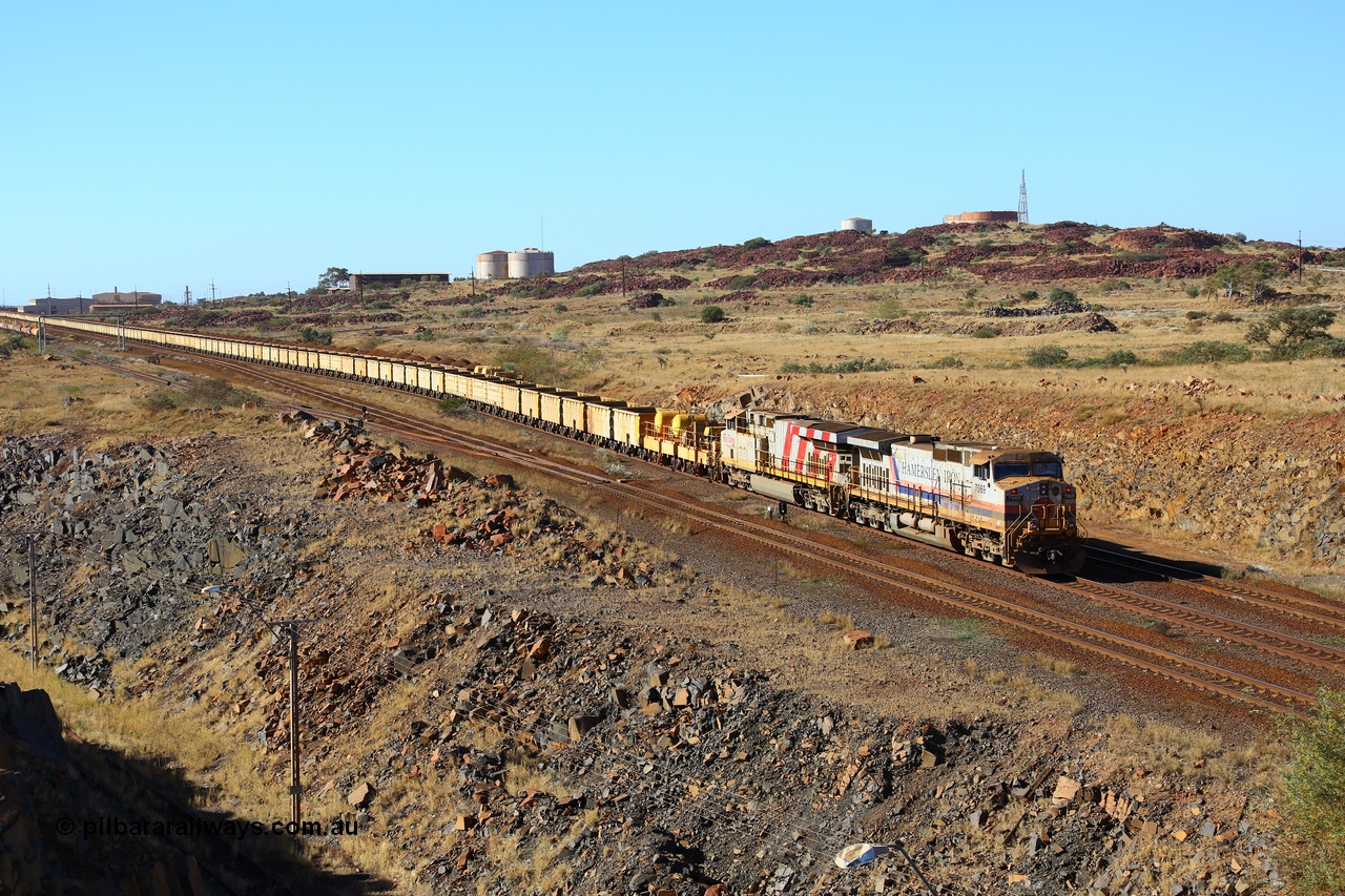 170729 0322
Parker Point, an empty train is worked back towards Seven Mile yard along the Empty Car Line behind General Electric built Dash 9-44CW unit 7069 serial 47748 in the original Hamersley Iron livery from 1994 and ES44DCi unit 8195. 29th July 2017. [url=https://goo.gl/maps/26rFPJ7MdWK2]GeoData[/url].
Keywords: 7069;47748;GE;Dash-9-44CW;