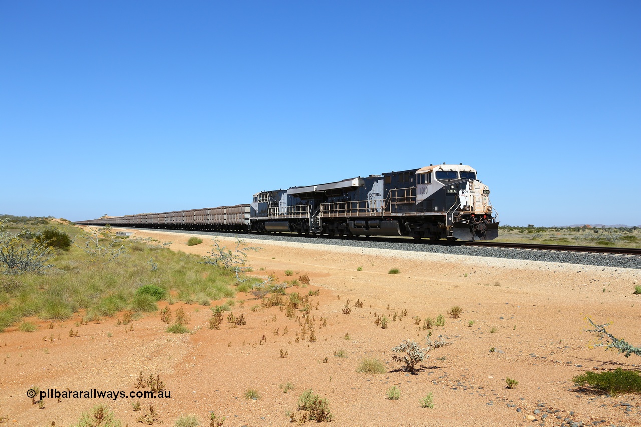 170730 0511
Indee, a loaded Roy Hill train runs along at the 71 km heading to the port behind General Electric built ES44ACi units RHA 1010 serial 62582 and RHA 1004 with 224 waggons and a mid-train remote in the middle. 30th July 2017. [url=https://goo.gl/maps/4pcTwmi7BmF2]GeoData[/url].
Keywords: RHA-class;RHA1010;62582;GE;ES44ACi;