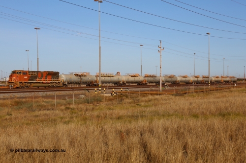 170727 9516
Nelson Point, BHP empty fuel train sits in the middle yard waiting to shunt the waggons across to the gantry to be reloaded for their next run to the mine, behind Progress Rail Muncie USA built EMD unit SD70ACe/LCi 4468 serial 20148001-001 and eleven 100,000 litre tank waggons. 27th July 2017.
Keywords: 4468;Progress-Rail-Muncie-USA;EMD;SD70ACe/LCi;20148001-001;