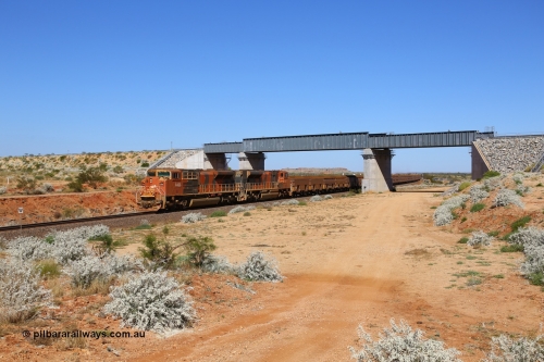 170727 9620
Woodstock Siding, a loaded BHP iron ore train passes under the Roy Hill overpass behind Progress Rail Muncie USA built EMD SD70ACe/LCi unit 4466 serial 20138907-017 and sister 4367. 27th July 2017. [url=https://goo.gl/maps/peEKeGz9sKS2]GeoData[/url].
Keywords: 4466;Progress-Rail-Muncie-USA;EMD;SD70ACe/CLi;20138907-017;