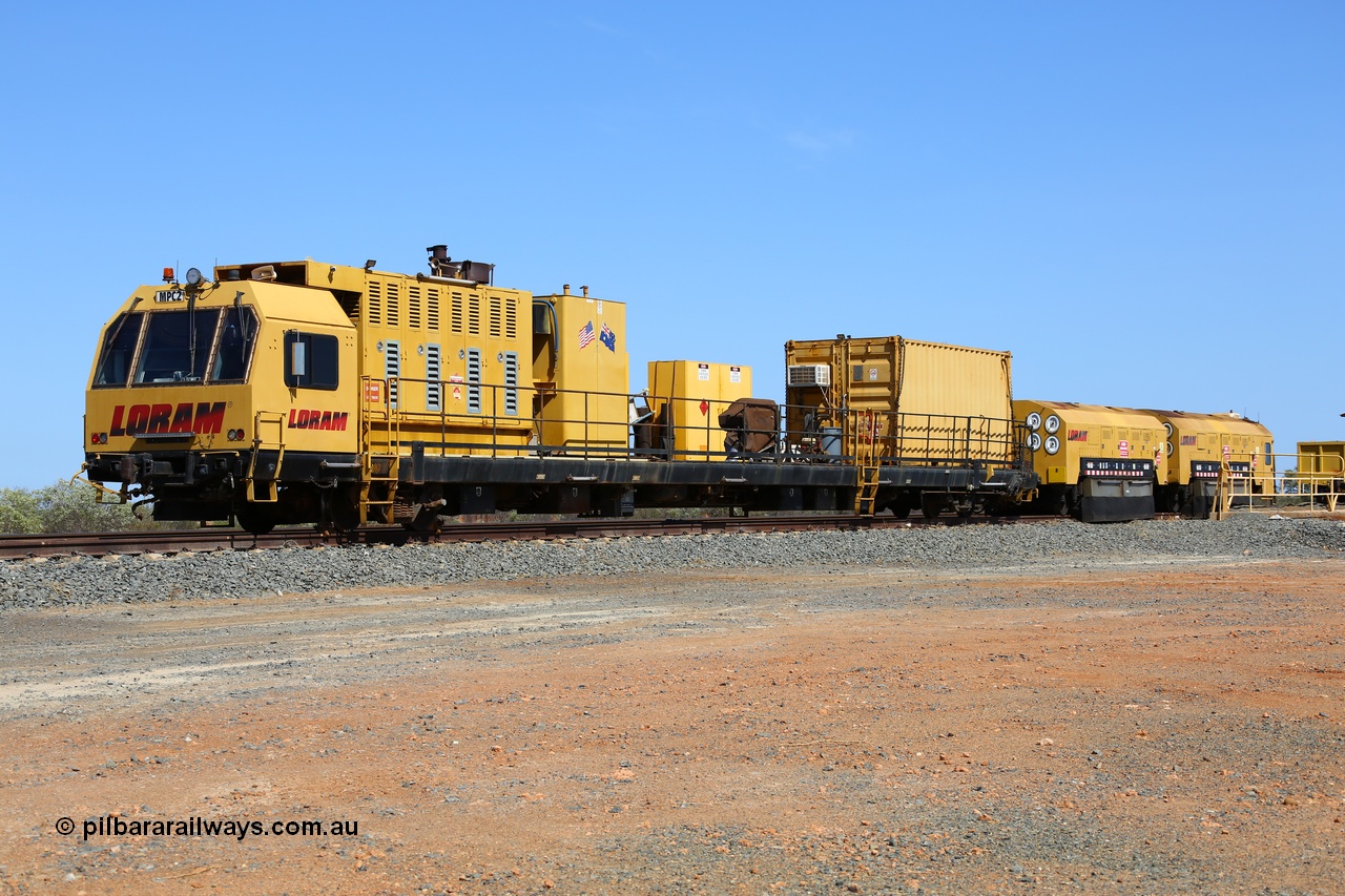 171121 0970
Barker Siding, Loram rail grinder MPC 2, this was sent out from the USA where it was operational as LMIX 602 for Loram. The generator and driving cab look to be fitted to an 85 foot piggy back waggon. 21st November 2017.
Keywords: Loram;MPC2;rail-grinder;