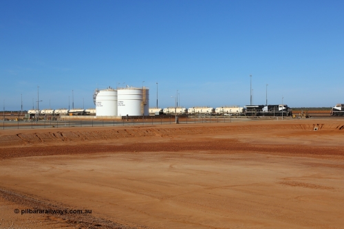 171018 0954
Tad Yard, overview of Roy Hill's fuel tanks and waggon loading gantry with a fuel train being loaded headed up by ES44ACi unit RHA 1020 serial number 64301 built in Erie Pennsylvania, USA by GE. 17th October 2018.
Keywords: RHA-class;RHA1020;GE;ES44ACi;64301;