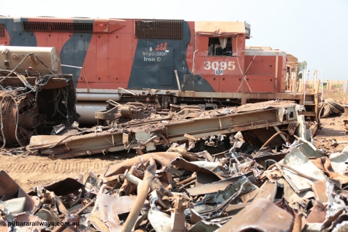 141027 5860
Wedgefield, Sell and Parker's metal recycling yard, view of EMD SD40R unit 3095 serial 33677/7083-7 watching a former sister unit being reduced to bits, fuel tank tipped on its side, pilot and bogie.
Keywords: 3095;EMD;SD40R;33677/7083-7;SD40;SP8485;