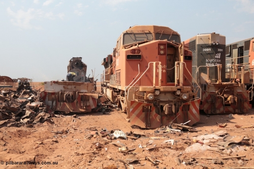 141027 5875
Wedgefield, Sell and Parker's metal recycling yard, General Electric AC6000 unit 6073 serial 51065 and EMD SD40R unit 3091 serial 31496/7861-6 look on as another SD40R unit is reduced to its frame and EMD 645 engine.
Keywords: 6073;GE;AC6000;51065;3091;EMD;SD40R;31496/7861-6;