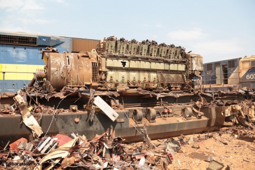 141027 5884
Wedgefield, Sell and Parker's metal recycling yard, General Electric AC6000 unit 6071 serial 51063 6600 hp GEVO-16 motor and GE 5GMG201 alternator awaiting the thermal lance.
Keywords: 6071;GE;AC6000CW;51063;